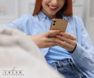 Person looking at their phone while navigating modern dating apps and terminology.