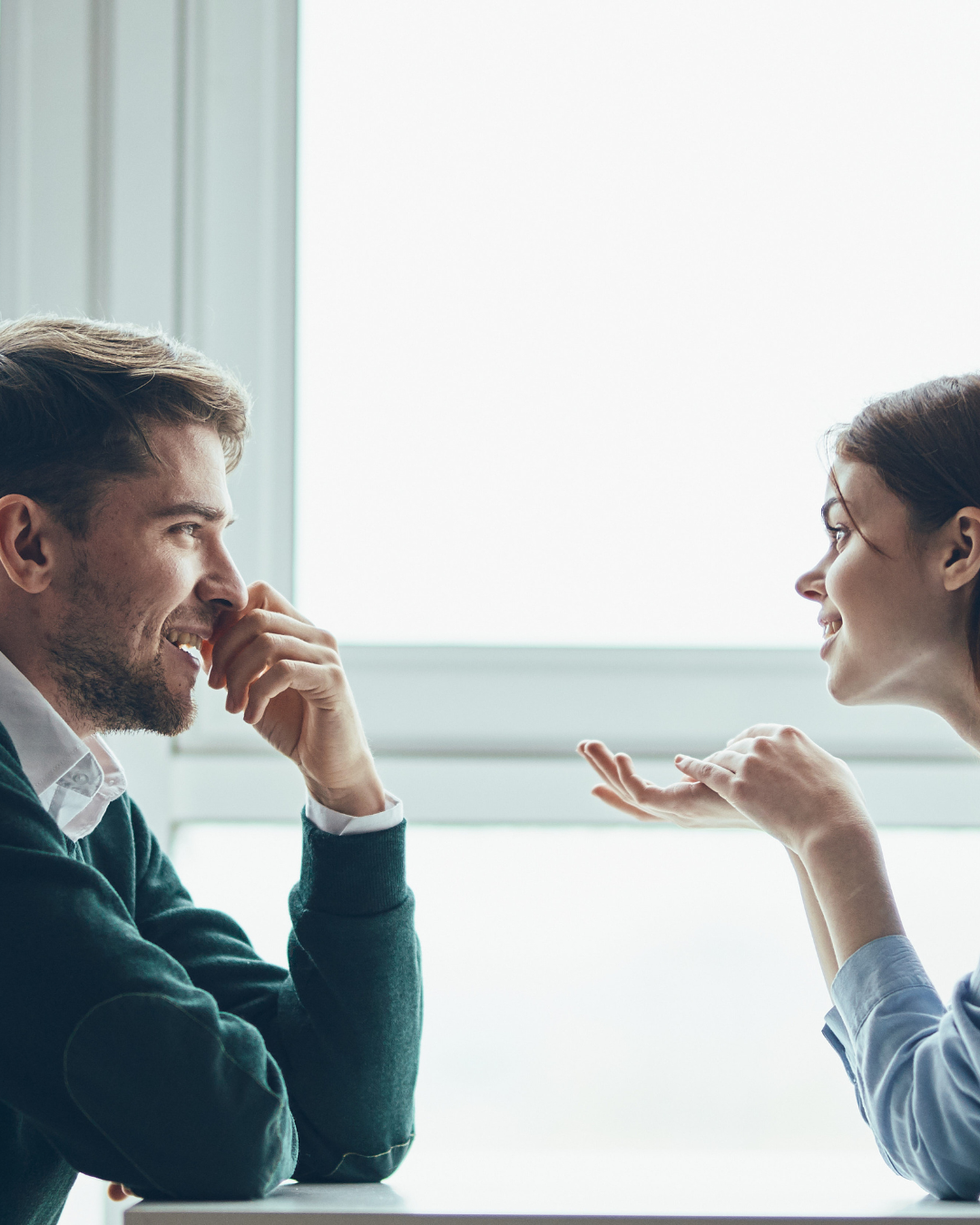 A man and a woman talking