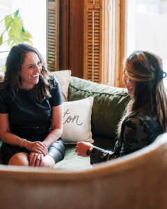 Amanda speaking with a matchmaking client.