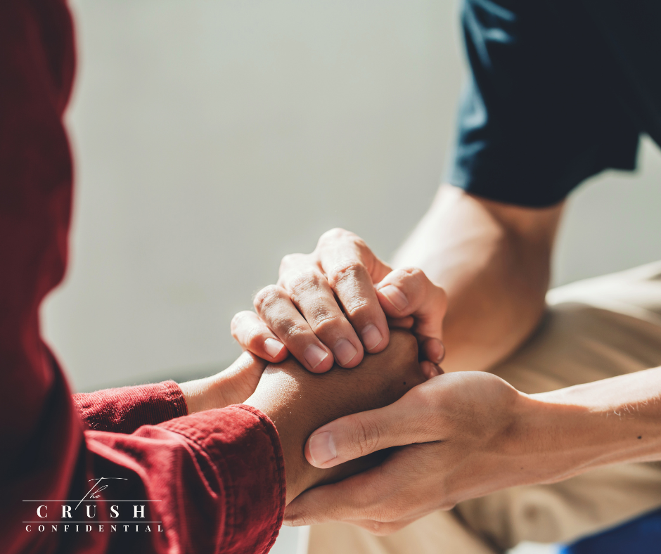 Couple holding hands over coffee, representing secure attachment and emotional connection.